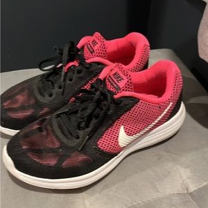 Nike Revolutions size 7.5